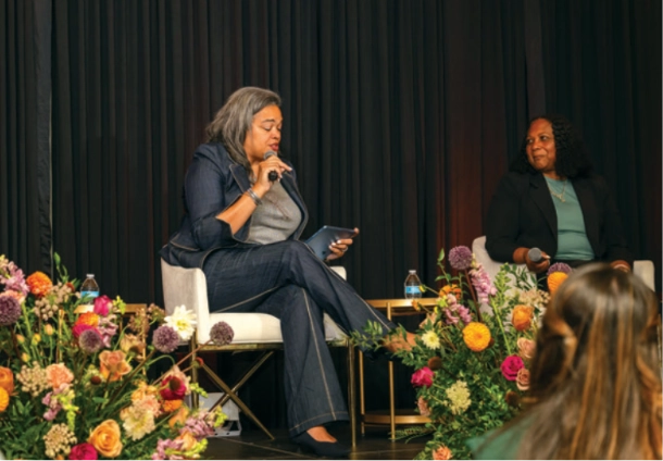 A speaker on stage at the State of Affordable Housing forum